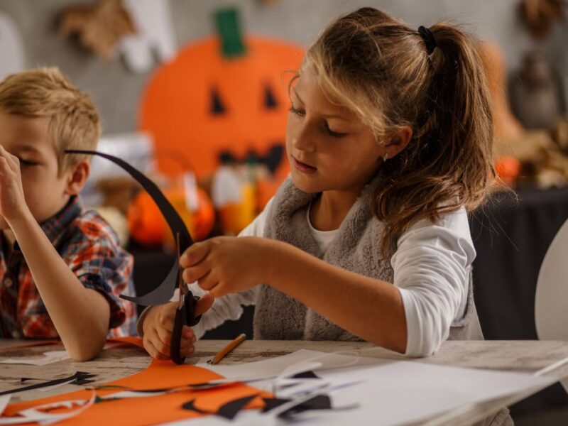 toddler-girl-making-halloween-crafts-at-home