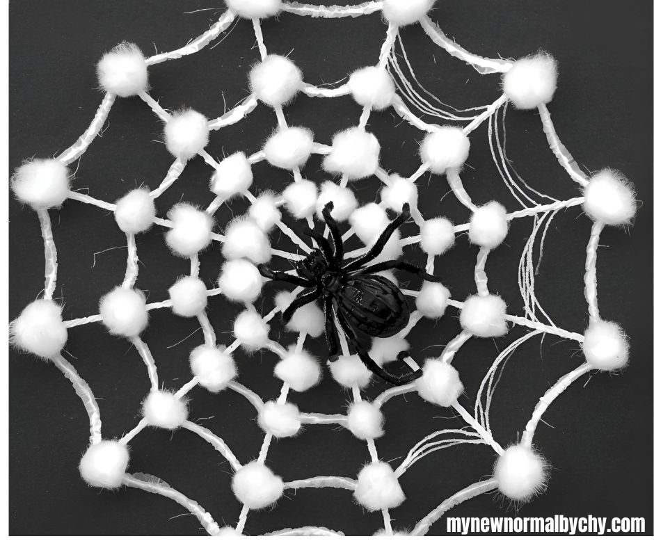 25-easy-halloween-crafts-toddlers-can-make-at-home-cotton-ball-spider-web