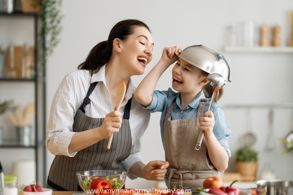 a-young-boy-and-his-mom-cooking-in-the-kitchen