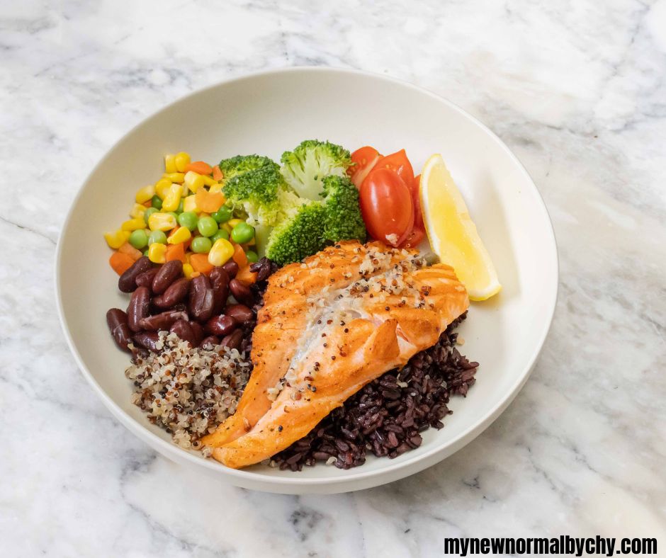a-plate-of-brown-rice-veggies-and-salmon
