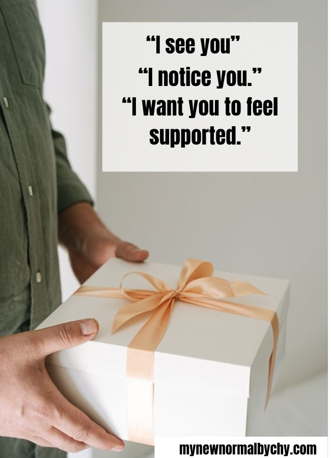 a-photo-of-a-mans-hand-holding-a-gift-box