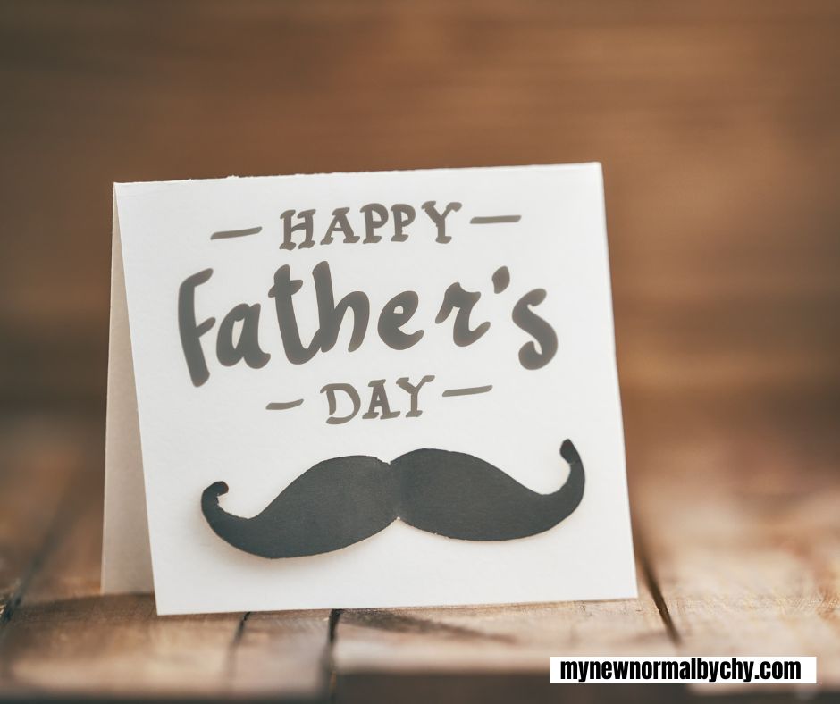 a-happy-father's-day-card-on-a-rustic-table