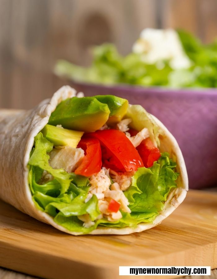 an-image-of-a-vegetable-wrap-on-a-wooden-table