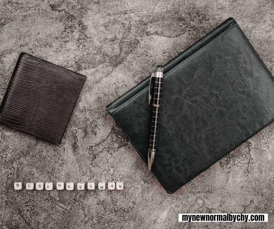 two-leather-wallets-on-a-concrete-surface
