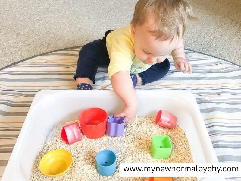 Oatmeal-Sensory-Bin-Sensory-Play-Ideas-for-Toddlers-With-Autism