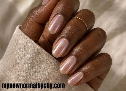 shiny-pearl-glazed-donut-nail-design-on-a-black-hand