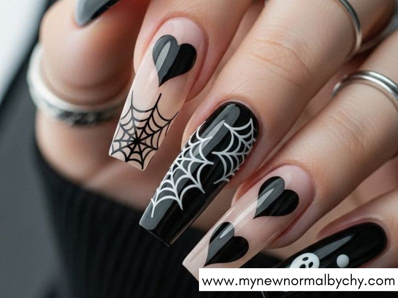 Black-Hearts-with-Halloween-Details-Cute-Halloween-Nails-You'll-Want-to-Copy-This-Spooky-Season