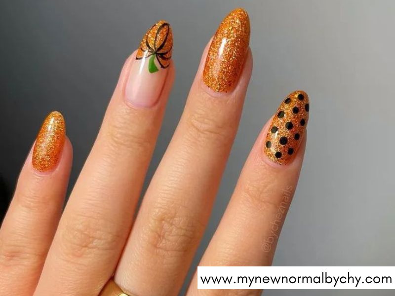 Glitter-Pumpkin-Nails-Cute-Halloween-Nails-You'll-Want-to-Copy-This-Spooky-Season